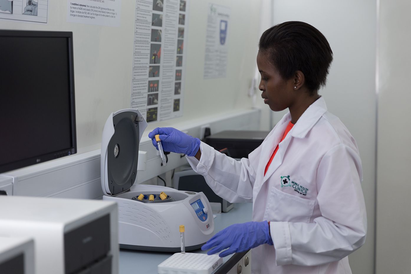 Nurse performing a test on a mobile health clinic